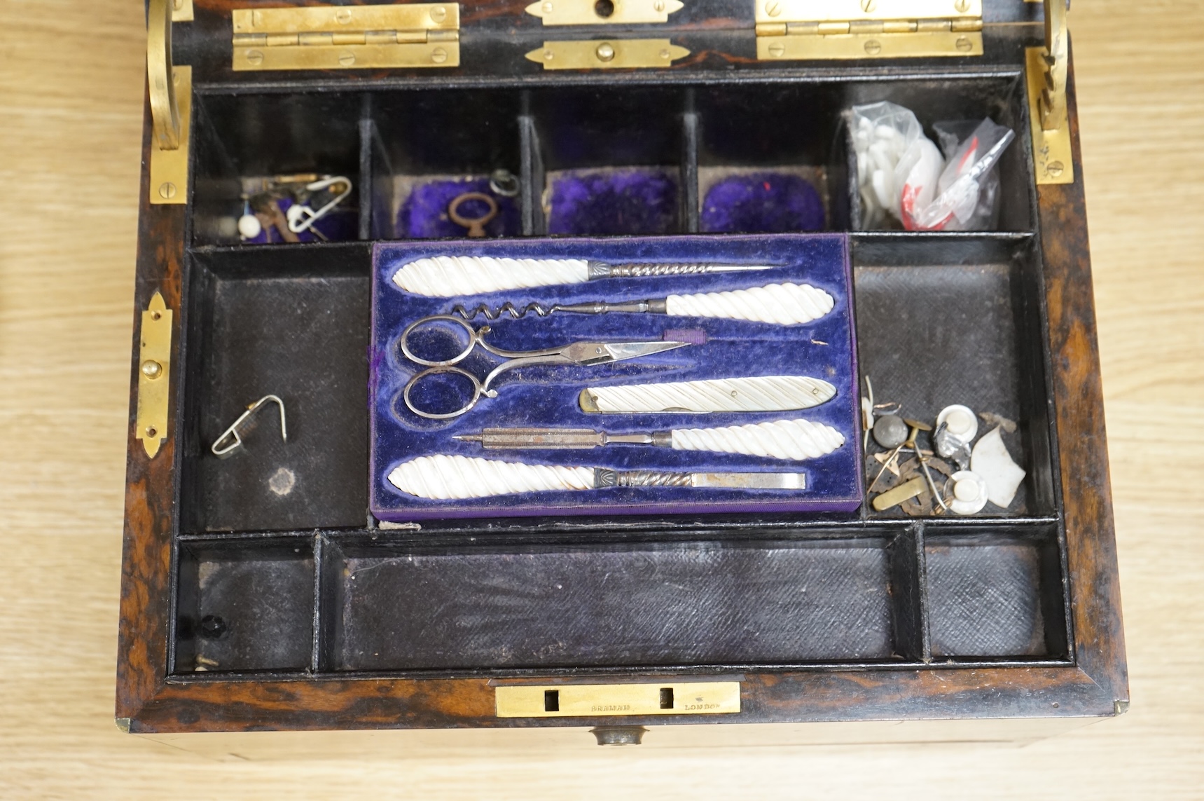 A 19th century brass bound coromandel dressing box, 31cm wide x 20cm high